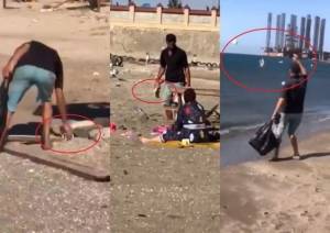 Kişi çimərlikdəki zibilləri toplayıb dənizə atdı -
