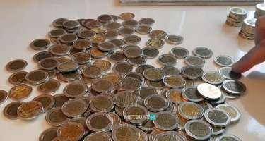 Üzərində gerb olan qəpikləri niyə baha alırlar? - VİDEO